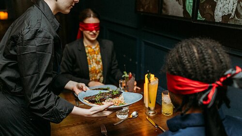 Couple on a unique dining experience with date ideas in Bristol through Yuup