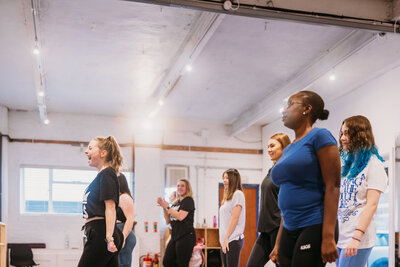 People dancing in a dance studio 
