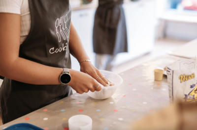 Close up on guest mixing ingredients in a bowl