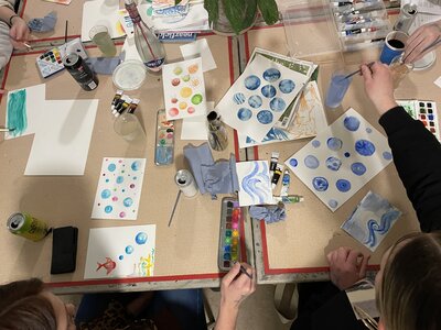 Creative watercolour workshop with splashes of colour and cups of joy