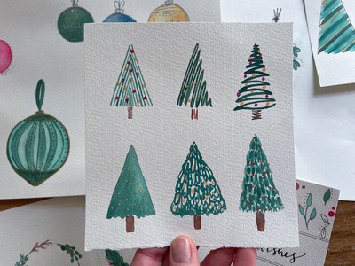 Hand-drawn Christmas trees adding festive flair.