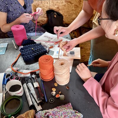 Crafty hands meet colourful yarn in a cosy knitting session