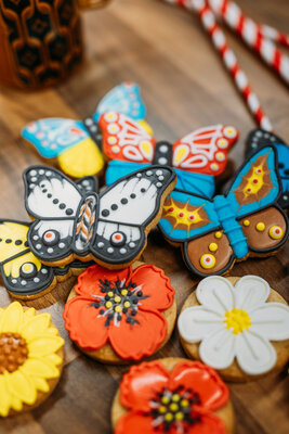 Butterfly and flower-themed biscuits, deliciously crafted for a sweet delight!