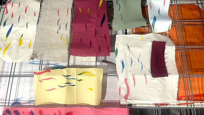 Vibrant fabric samples with colourful abstract patterns.