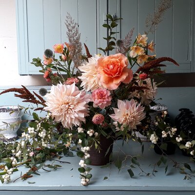 Vibrant floral arrangement with soft pastel blooms.