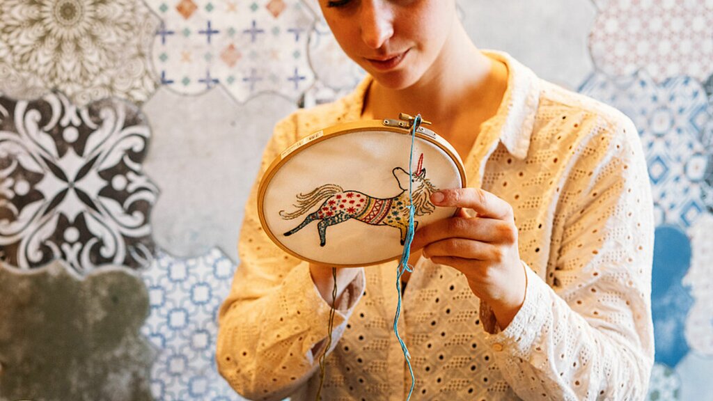 person learning hand-embroidery in Bristol sewing workshop things to do learn new hobby 