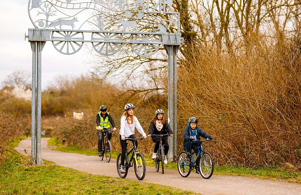 Family day out by bike on the Strawberry Line